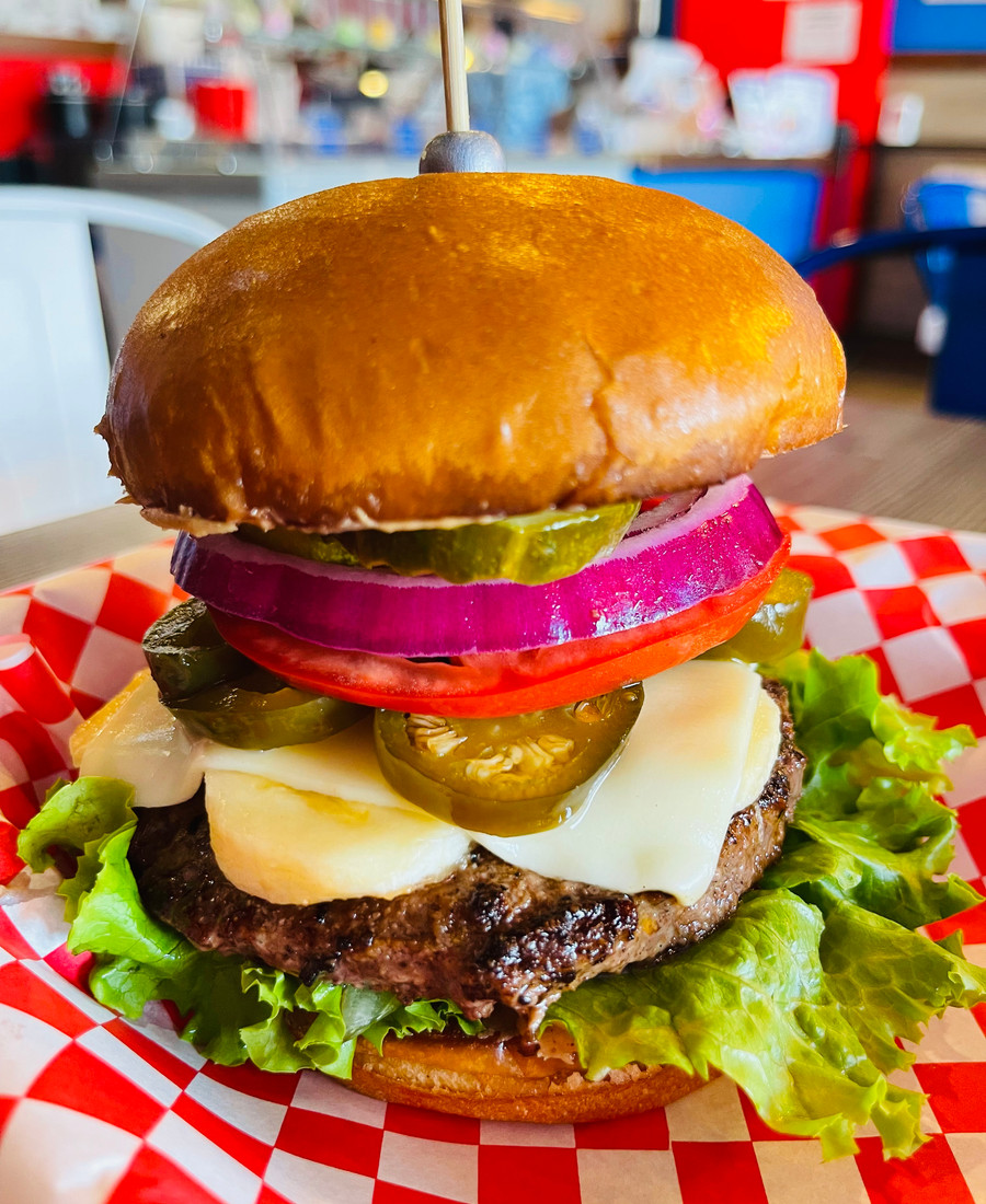 Loaded Quig's burger close up